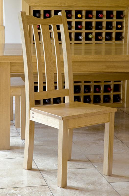 Oak dining chair by Chris Tribe